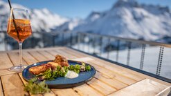 Schlegelkopf Restaurant - Ski Arlberg Gericht des Schlegelkopf Restaurants mit Aperol